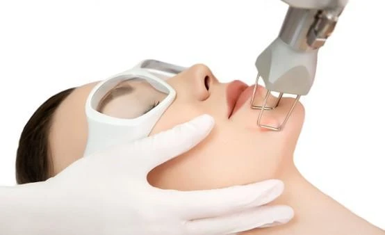 Patient wearing protective glasses while receiving treatment